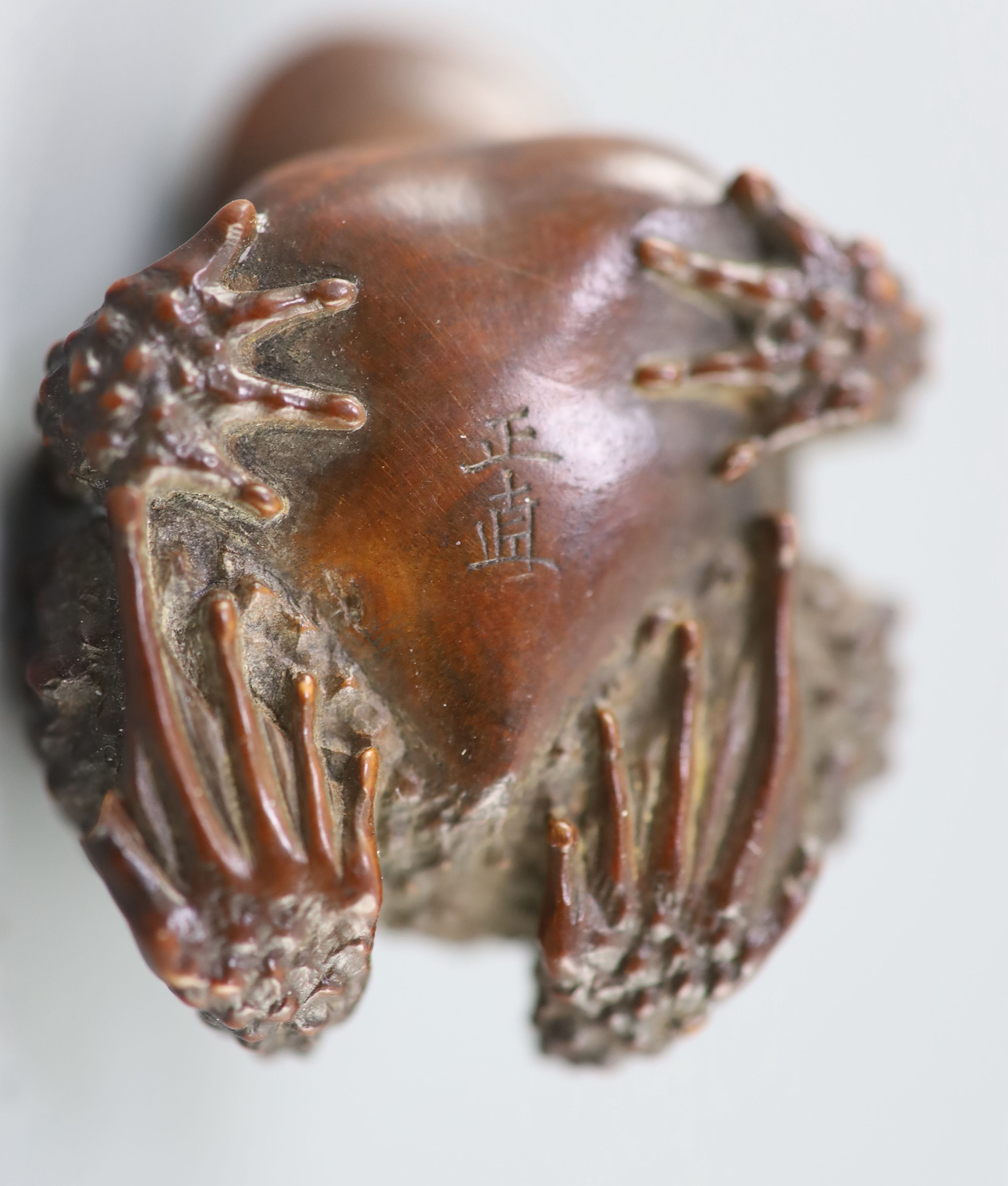 A fine Japanese wood okimono of toads, signed Masanao, 19th century,